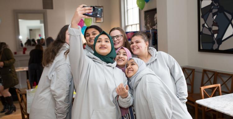 Group of schoolchildren taking a selfie