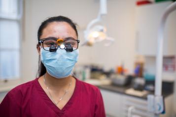 Dentist with special glasses 