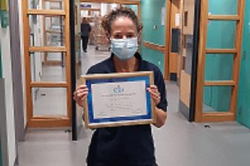 Sam Walklett with award 