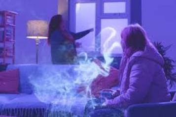 House with two people showing air particles 